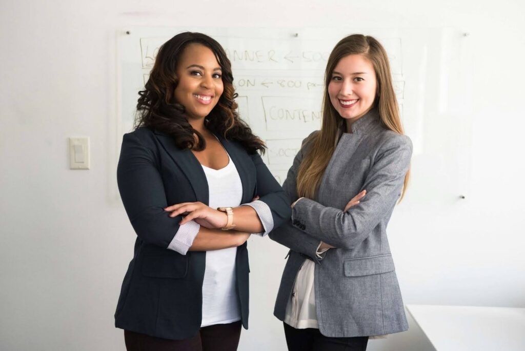 2 ladies in corporate wear