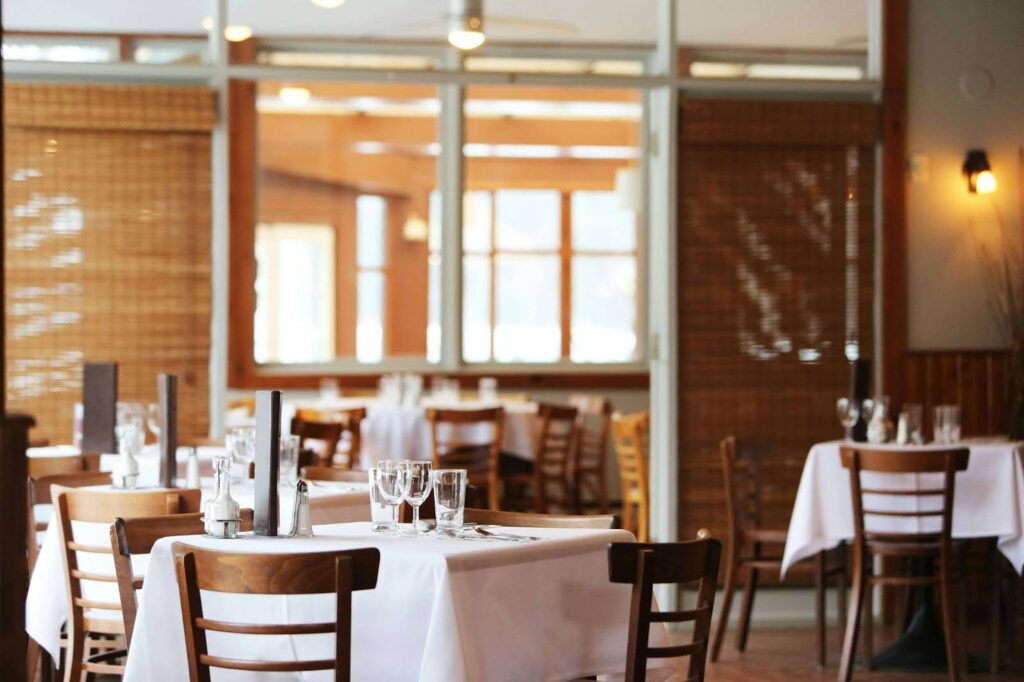 Elegant restaurant interior with neatly arranged tables.