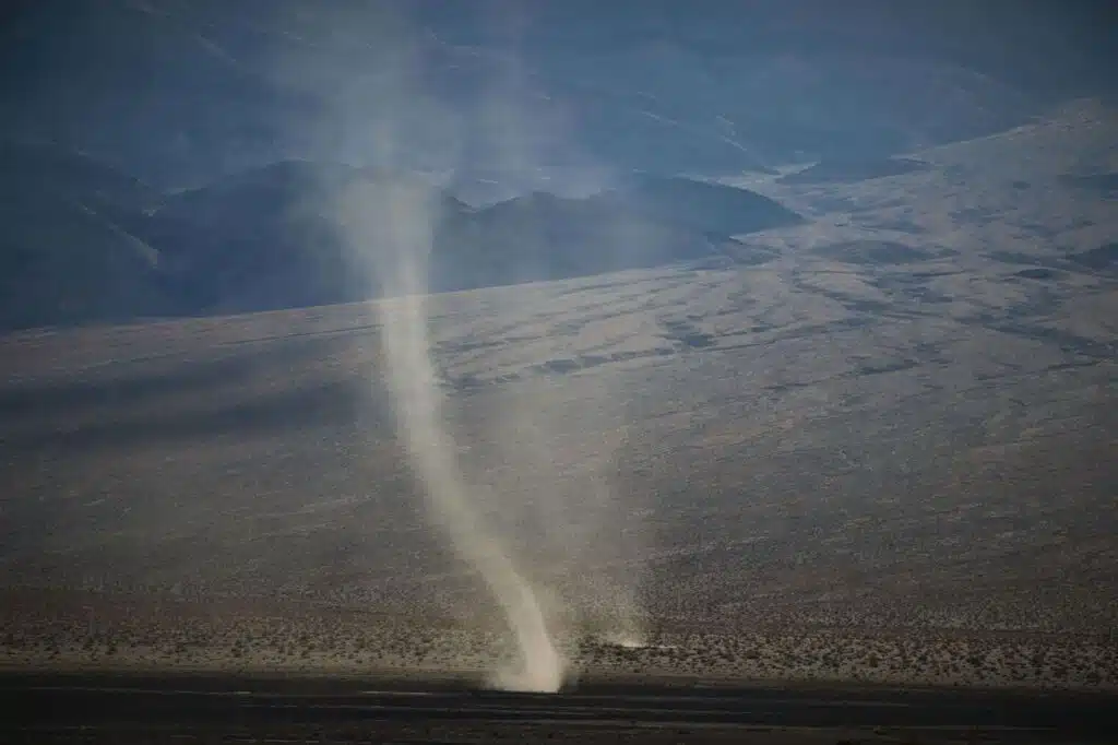 An active tornado in the middle of a road.